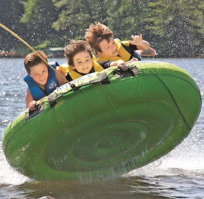Kids tubing in Three Lakes